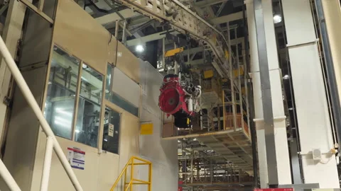 Factory Assembling of machinery Automobile Modern diesel Engines on Production Stock Footage 310307962