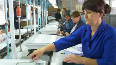 Factory assembly line assembly of electric heaters by hand. Video stock 277339872