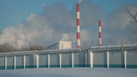 Factory Behind the Fence with Barbed Wire Stock Footage 99714905