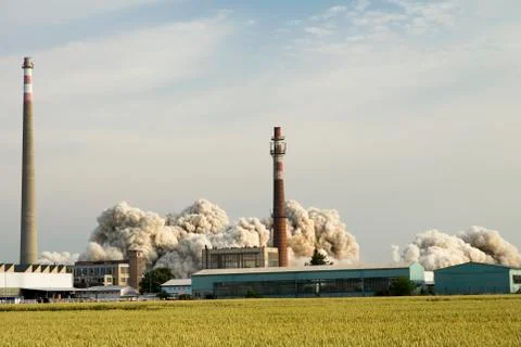 Factory being teared down by demoliton, implosion Stock Photos