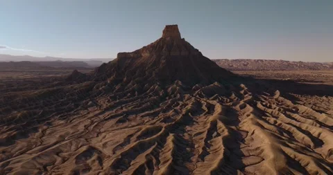 Factory Butte Above Eroded Desert Terrain Utah Pullback Aerial Stock-Footage 333872854
