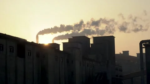 A factory chimney belching smoke Stock Footage 248887959