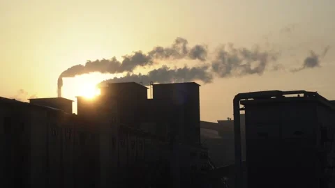 A factory chimney belching smoke Stock Footage 248887966