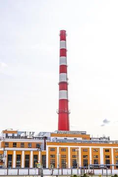 Factory chimney stack red and white in Brest Belarus. Stock Photos