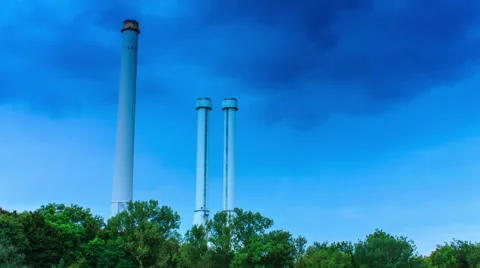 Factory chimney  under blue sky - timelapse Stock Footage 54948015
