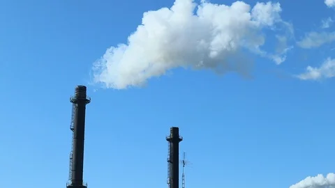 Factory Chimney White Smoke Pollution into Blue Sky Oil Refinery 库存影片 126980136