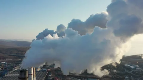A factory with chimneys that emit smoke. Stock Footage 170412717