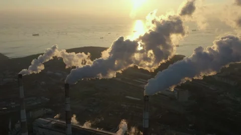 A factory with chimneys that emit smoke. Stock Footage 170997665