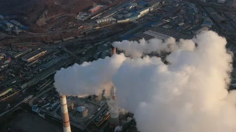 A factory with chimneys that emit smoke. Stock Footage 171309485