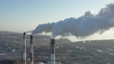 A factory with chimneys that emit smoke. Stock Footage 171647222