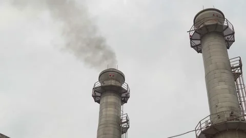 Factory chimneys emitting black smoke. Concept of pollution crisis Stock Footage 203901629