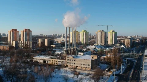 Factory chimneys smoke in winter drone video Video stock 129366847