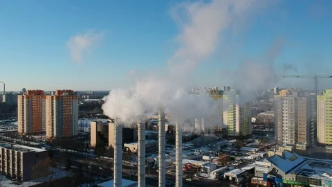 Factory chimneys smoke in winter drone video Video stock 129366861