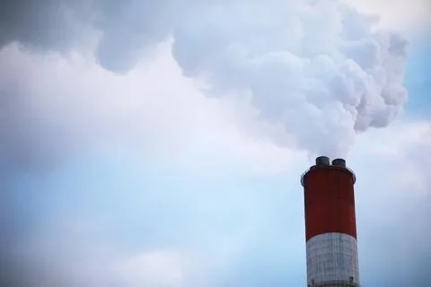 Factory in the city. Cityscape. Environmental problem of environmental poll.. Stock Photos