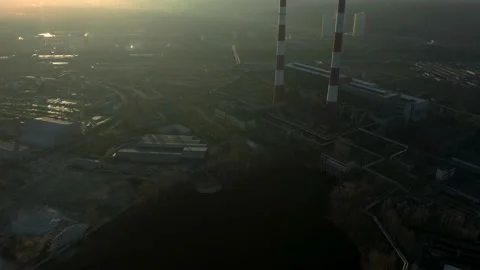 Factory in the city, top view two pipes from which smoke comes. Stock Footage 132667403