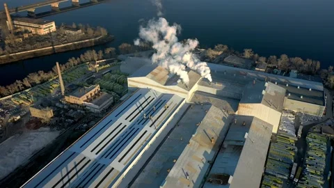 Factory in the city, top view two pipes from which smoke comes. Vídeos de archivo 132667437