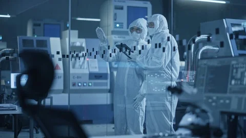 Factory Cleanroom: Engineer and Scientist Talk and Use Tablet Computer Stock Footage 126152013