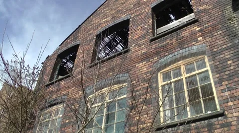 Factory collapsed roof derelict moving clouds urban decay Stock Footage 47236264
