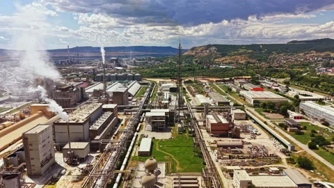 Factory complex in an industrial area with production facilities and machinery Video stock 340962789