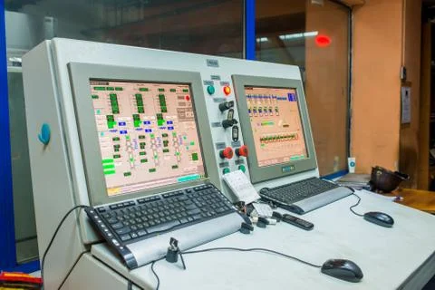 Factory control room with computers Stock Photos