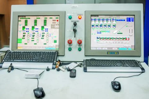 Factory control room with computers Stock Photos