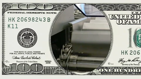 Factory conveyor line in frame of 100 dollar bill Stock Footage 97198912