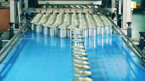 Factory conveyor is transporting tin cans Stock-Footage 148624955
