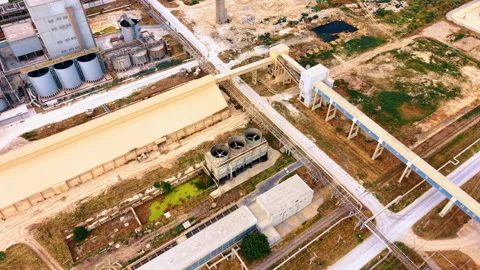 Factory cooling units and conveyors across processing complex. Elevated view Stock Footage 339367702