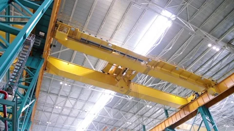 Factory crane moves on top of a large workshop Stock Footage 47479120