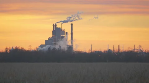 Factory Emissions with Nature in Foreground Stock Footage 49234865