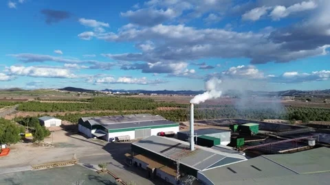 Factory emites smoke pollution contamination in Spain Stock Footage 265945383