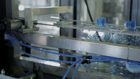 At factory empty bottles are washed with clean water automatically. Stock Footage 81124125