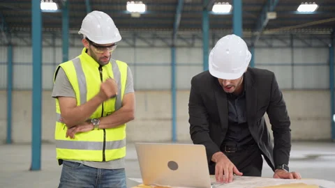 Factory engineer brainstorming on warehouse work problems. Stock Footage 155701127