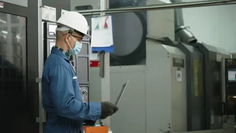 Factory engineer check machine equipment. Safety Mask to prevent Coronavirus Stock Footage 136154689