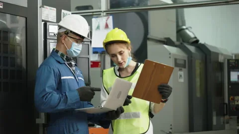 Factory engineer check machine equipment. Safety Mask to prevent Coronavirus Stock Footage 136154826