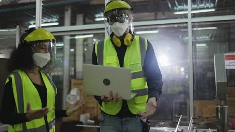 Factory engineer check machine equipment. Wear protective equipment.  Stock Footage 154315862