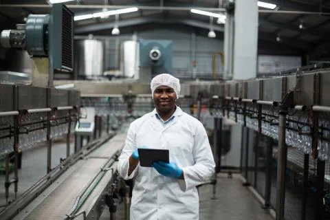 Factory engineer using digital tablet in the factory 스톡 사진