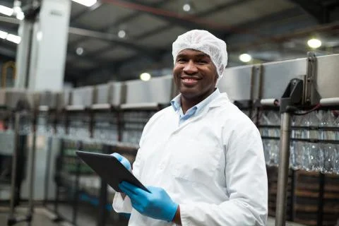 Factory engineer using digital tablet in the factory 写真素材