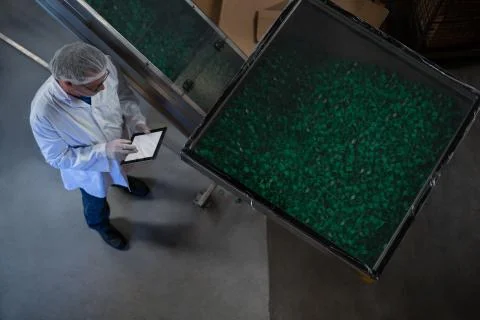 Factory engineer using digital tablet in the factory Stock Photos