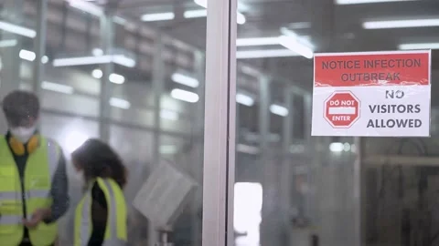 Factory engineer workers with face mask protection checking machine. Stock Footage 154918096