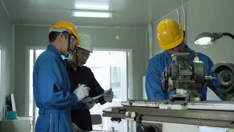 Factory engineers are producing spare parts within the factory. Stock-Footage 154876198