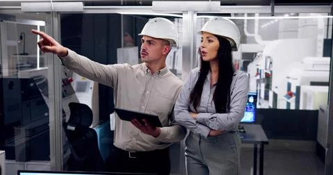 Factory Engineers In Helmets 스톡 사진