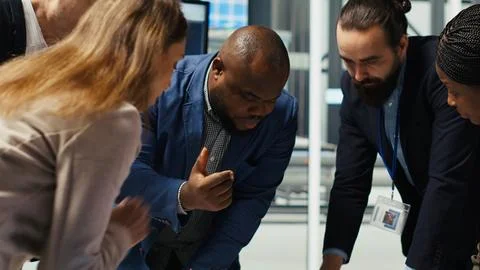 Factory engineers refining production layouts using tablet Foto stock