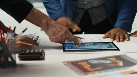 Factory experts design assembly facility production lines in tablet CAD program Foto stock