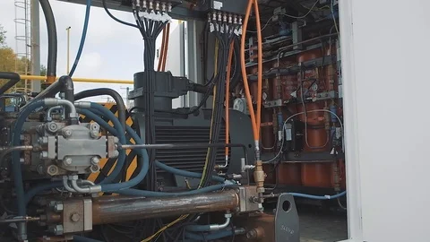 Factory external compartment with many cables and mechanisms Stock Footage 125880997