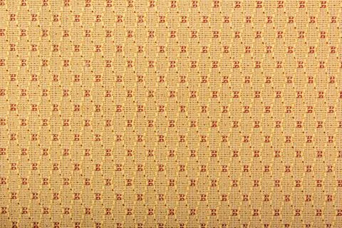 Factory fabric interspersed with red patterns. Close-up of a long and wide Stock Photos