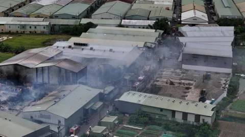 Factory Fire in Northern Taiwan with Distant Highway View Stock Footage 273306589