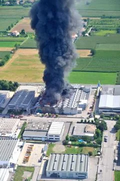 Factory fire with smoke Stock Photos