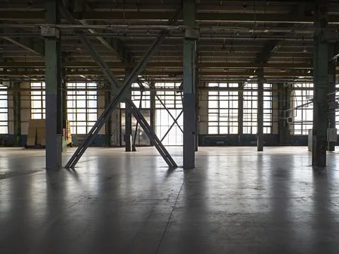 Factory floor scene, empty abandoned plant, concept of closed manufacture Stock Photos
