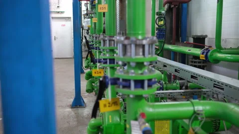 Factory green tubes with variable focal length Stock Footage 151755591